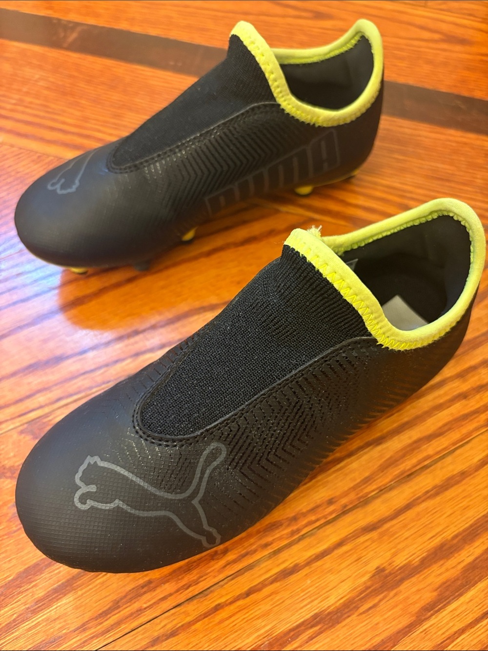 Puma Kids Black Slip On Soccer Cleats with Yellow Trim - US13C